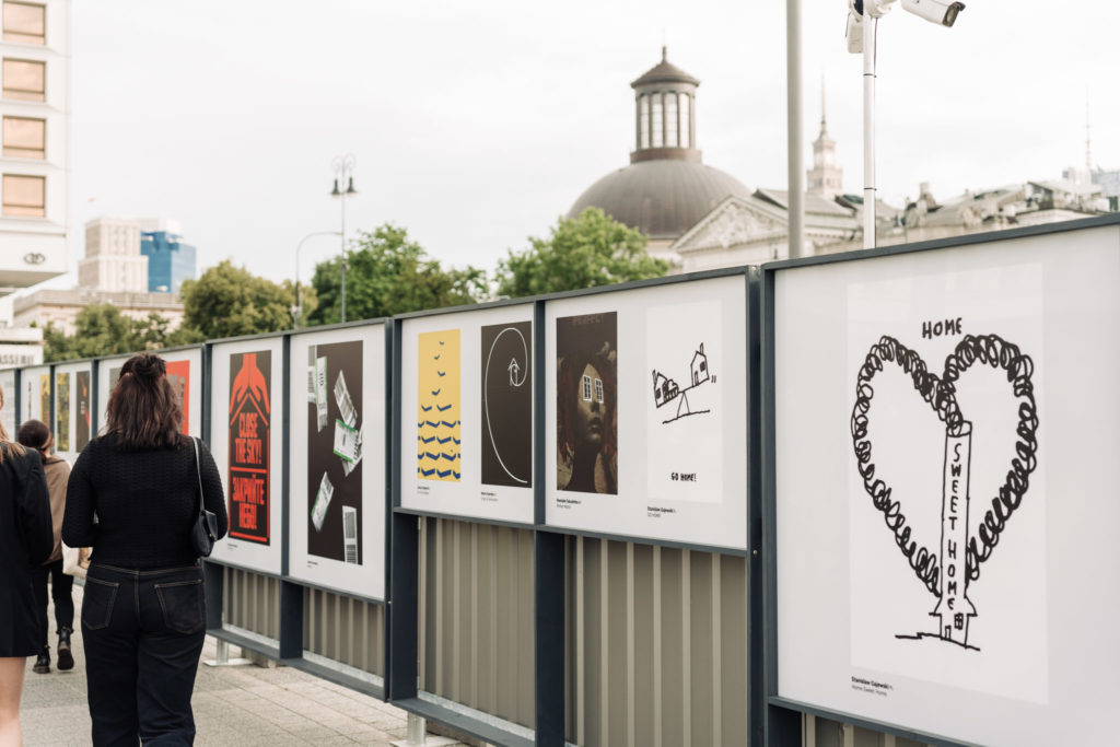 Posters presented on the fence surrounding the Palac Saski company work area.